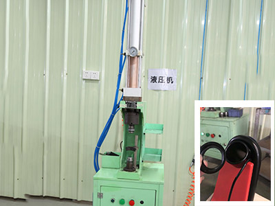 Hydraulic machine is used to assembly steel parts of scooter frame.